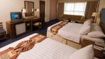 Jomtien Palm Beach 04-deluxe room2.jpg